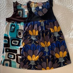 Two geometric printed sleeveless tops